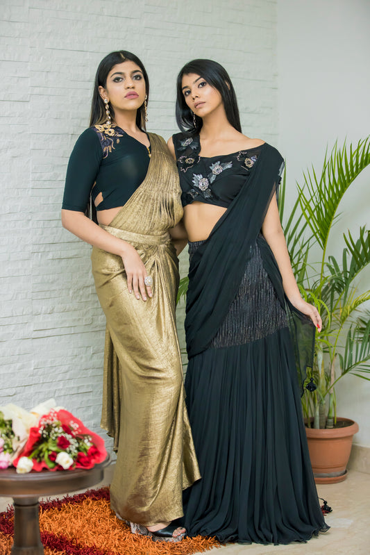 Glamorous Metallic Gold And Black Lycra Saree With Cutdana Embellishments