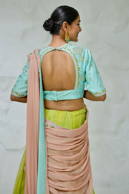 Elegant Green Kota Lehenga With Zari Border and Contrast Peach Pallu Styled With Sky Blue Dupion Silk Blouse