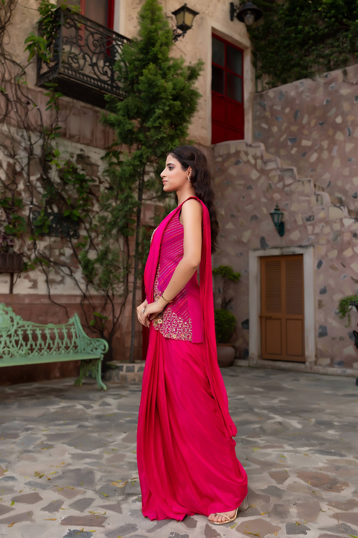 Magenta Draped Saree With Intricate Embroidered Sleeveless Blouse