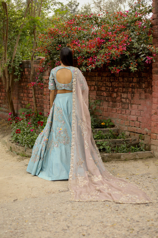 Luxury Pastel Blue Lehenga Set With Delicate Floral Embroidery Blouse And Soft Dupatta