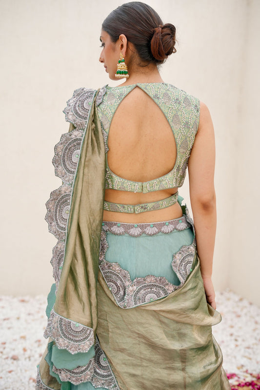 Sea Green Hand-Embroidered Wrinkle Lehenga Paired with Brocade Blouse and Cutwork Border Dupatta
