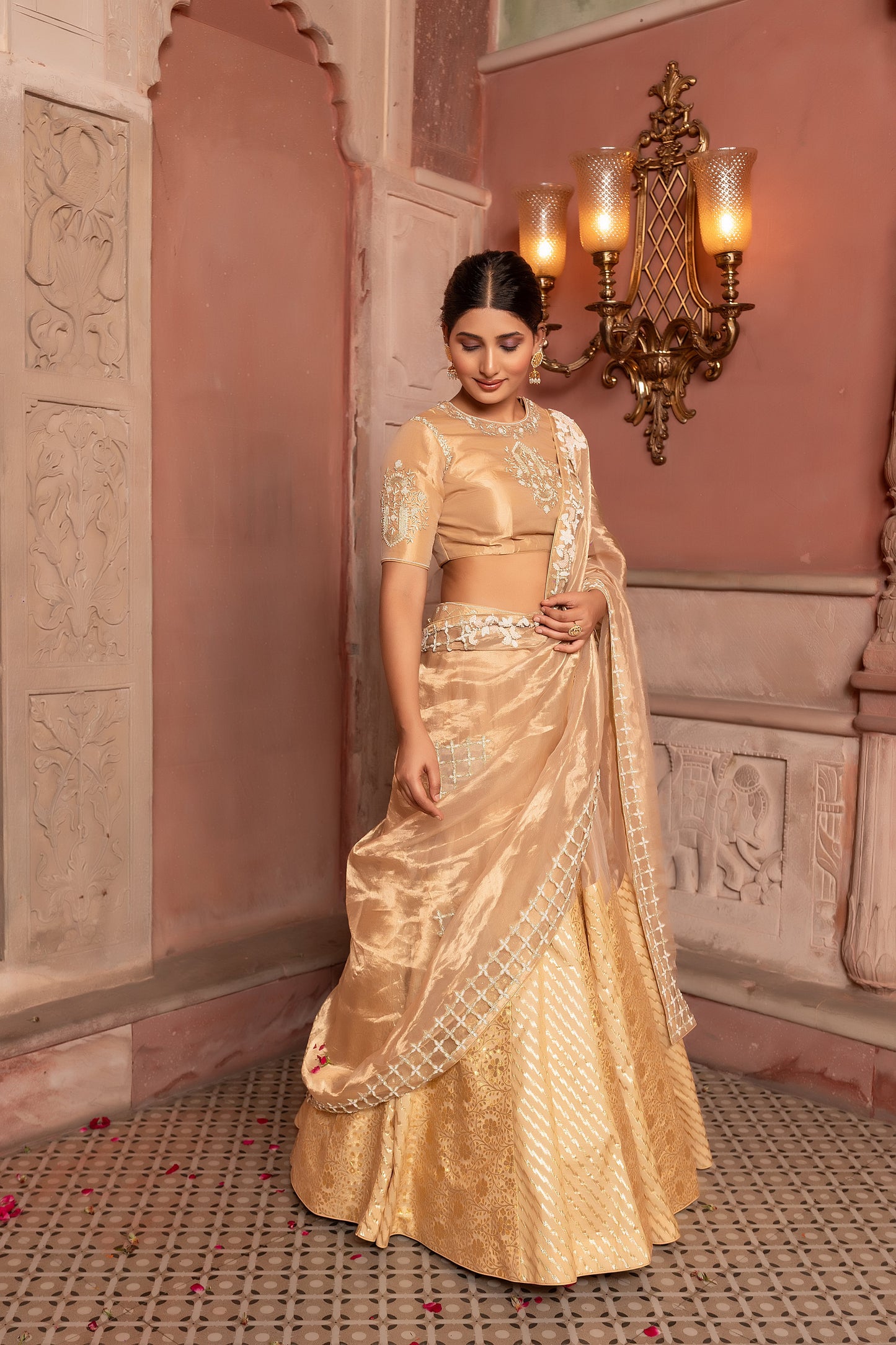 Luxury Golden Tissue Lehenga Choli with Intricate Embellishments and Cutwork Dupatta