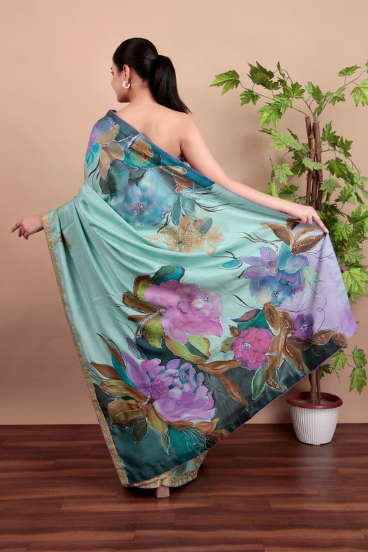 Luxury Sea Green Tulle Saree with Floral Painting and Sparkling Sequin Accents