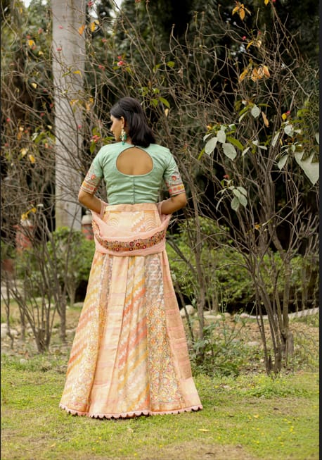 Luxury Peach-Mint Green Lehenga Saree Adorned with Mirror and Thread Embroidery