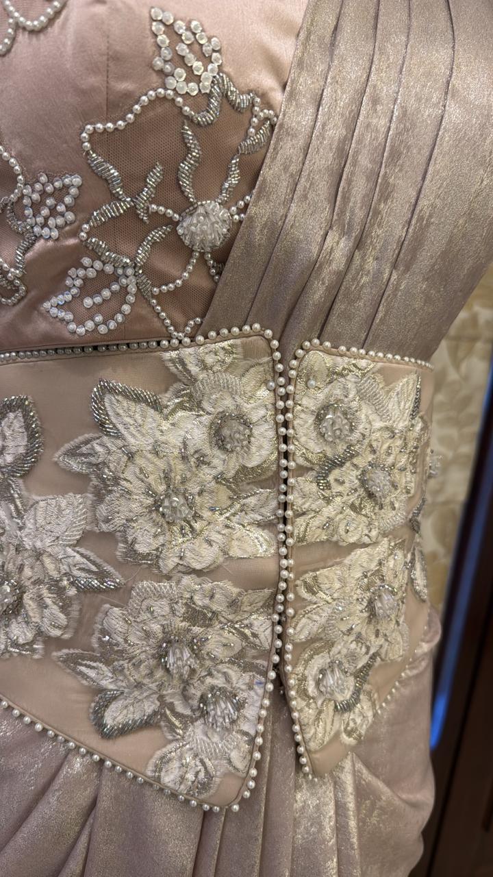 Champagne drape saree with heavy work on blouse and belt
