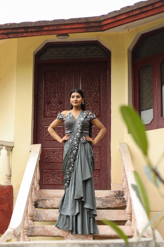 Belgium Green Draped Saree With Heavy Embroidered Pallu And Corset Blouse