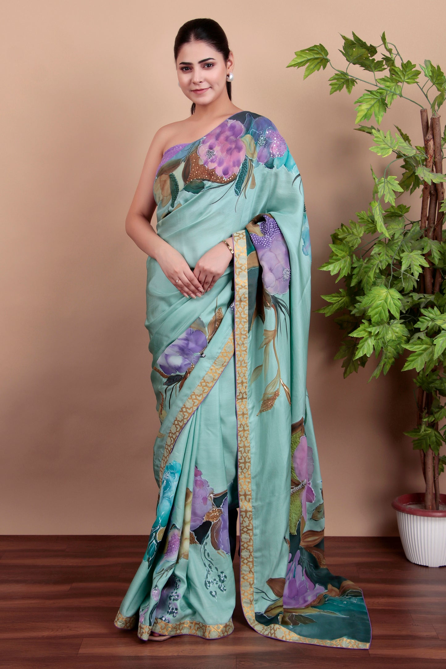 Luxury Sea Green Tulle Saree with Floral Painting and Sparkling Sequin Accents