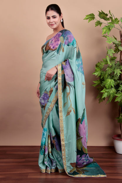 Luxury Sea Green Tulle Saree with Floral Painting and Sparkling Sequin Accents