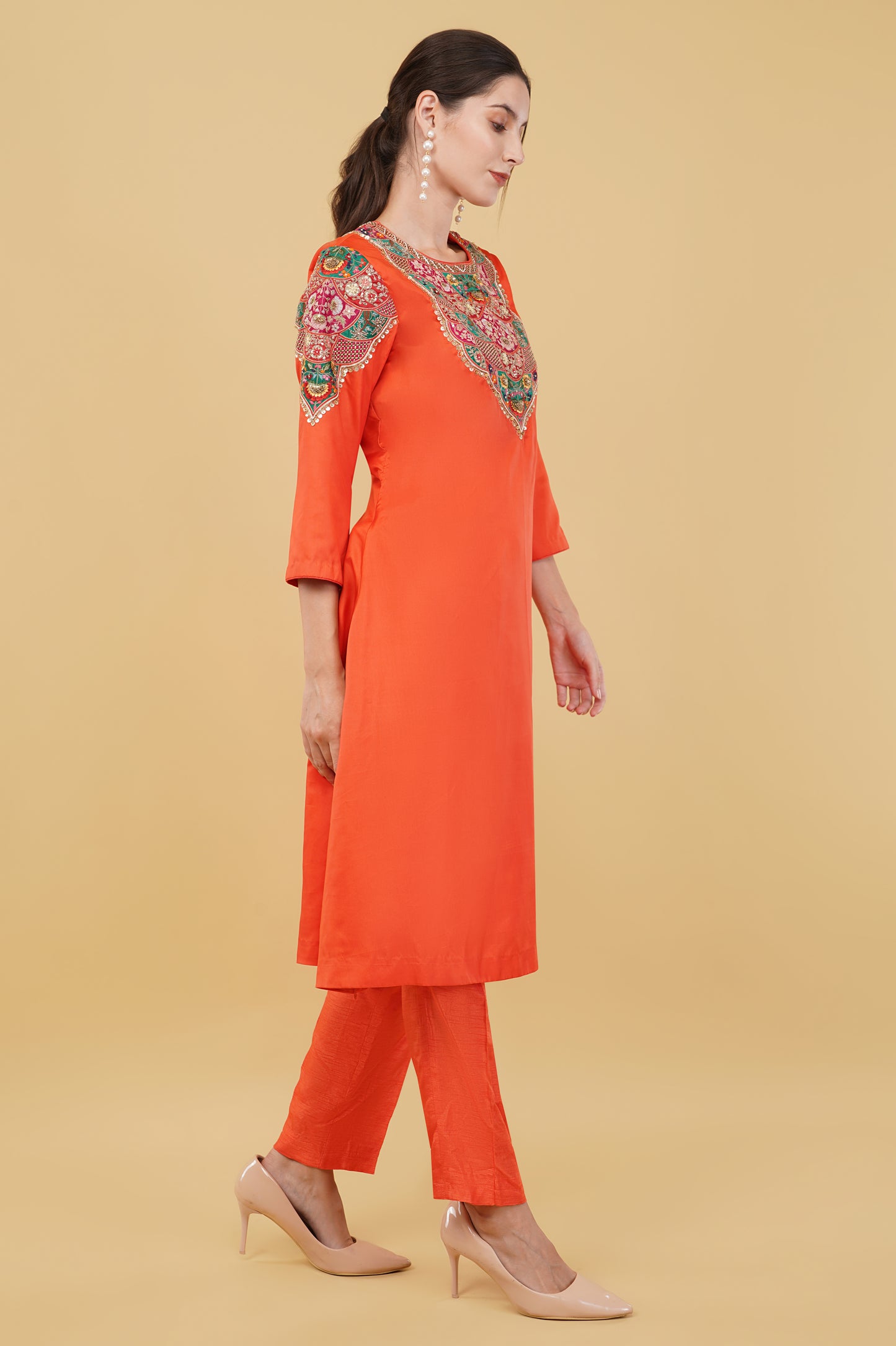 Festive Orange A-Line Kurta Ensemble with Matching Pants and Colorful Thread Work