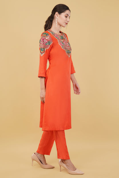 Festive Orange A-Line Kurta Ensemble with Matching Pants and Colorful Thread Work