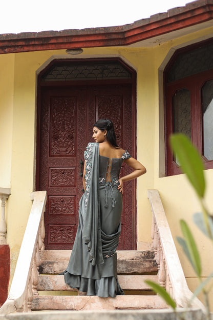 Belgium Green Draped Saree With Heavy Embroidered Pallu And Corset Blouse