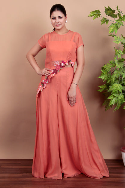 Elegant Coral Indo-Fusion Ensemble Featuring Sheer Top and Flared Palazzo