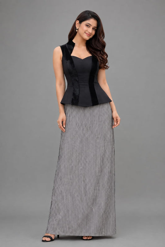 Black peplum top with black sequence skirt