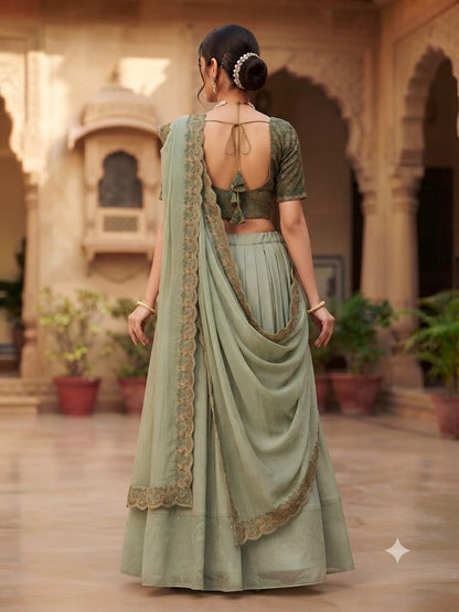 Soft sage green / pastel green lehenga saree .