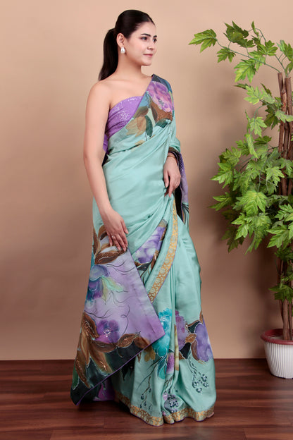 Luxury Sea Green Tulle Saree with Floral Painting and Sparkling Sequin Accents