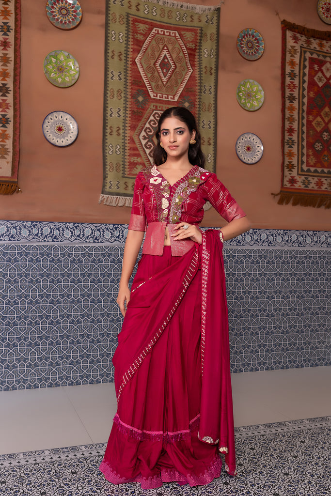 Wine saree with peplum design blouse & thread work on border