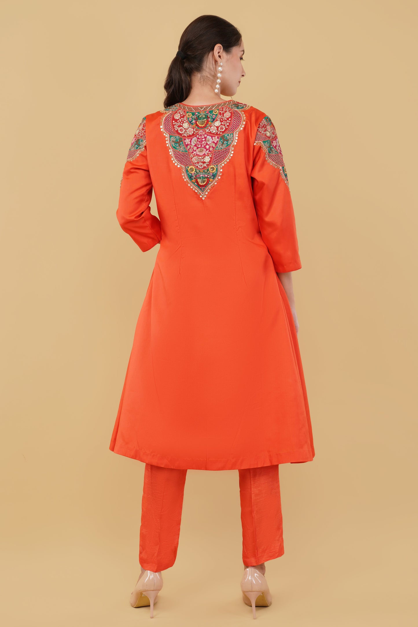 Festive Orange A-Line Kurta Ensemble with Matching Pants and Colorful Thread Work
