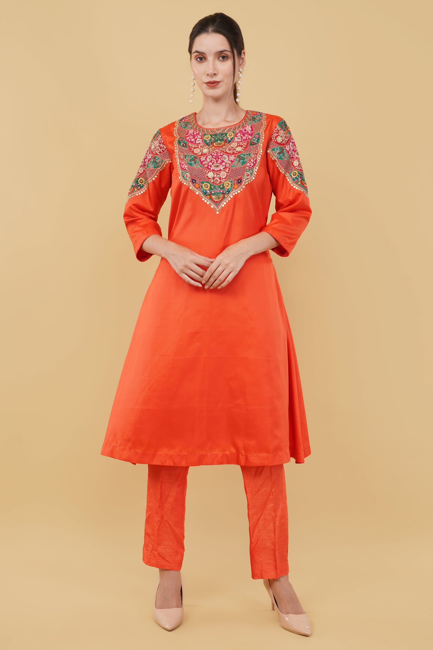 Festive Orange A-Line Kurta Ensemble with Matching Pants and Colorful Thread Work