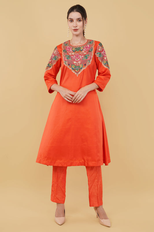Festive Orange A-Line Kurta Ensemble with Matching Pants and Colorful Thread Work