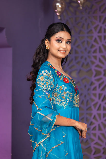 Luxury Peacock Blue Raw Silk Yoke Anarkali with Detailed Hand Embroidery