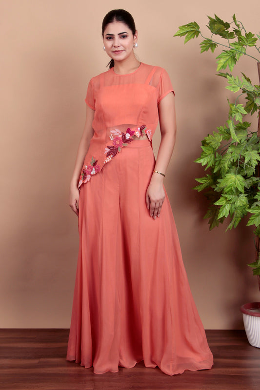 Elegant Coral Indo-Fusion Ensemble Featuring Sheer Top and Flared Palazzo