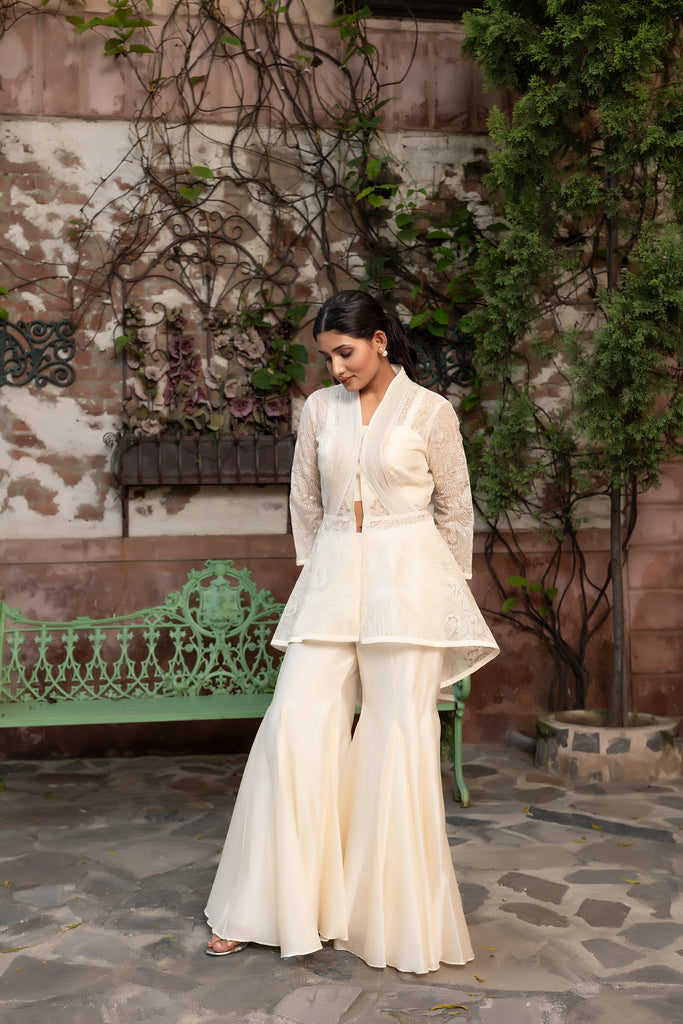 Off white 3 piece set with flair top, bustier & flair panel sharara.