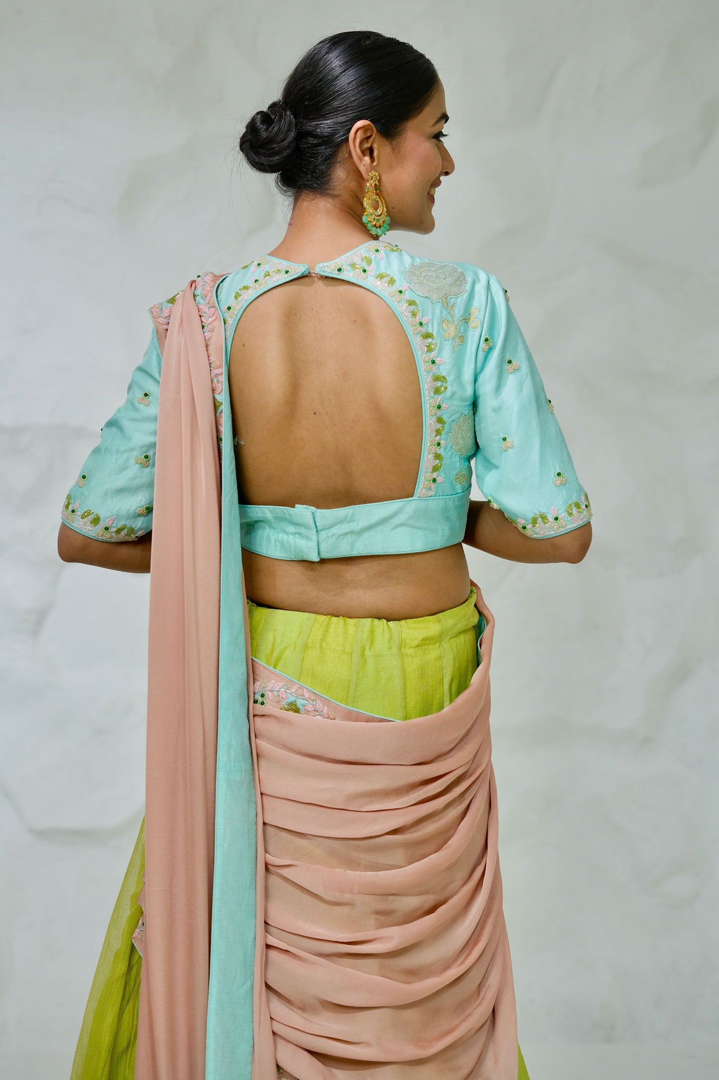 Elegant Green Kota Lehenga With Zari Border and Contrast Peach Pallu Styled With Sky Blue Dupion Silk Blouse