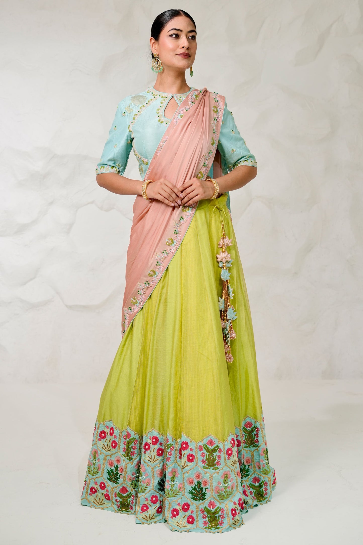 Elegant Green Kota Lehenga With Zari Border and Contrast Peach Pallu Styled With Sky Blue Dupion Silk Blouse