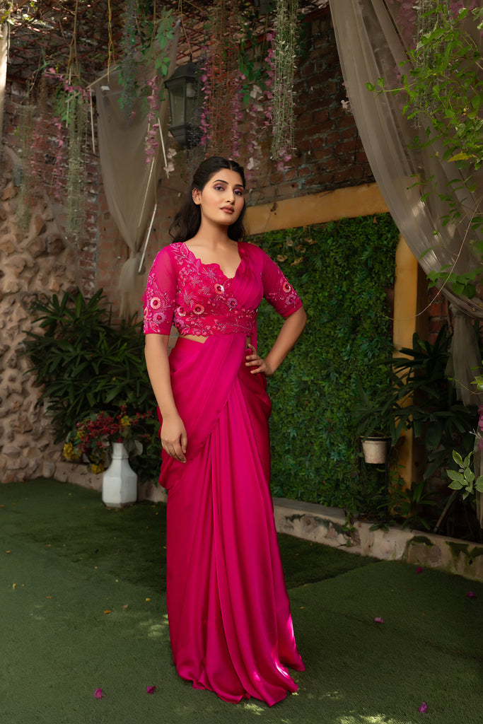 Magenta color Drape saree with heavy embroidered blouse