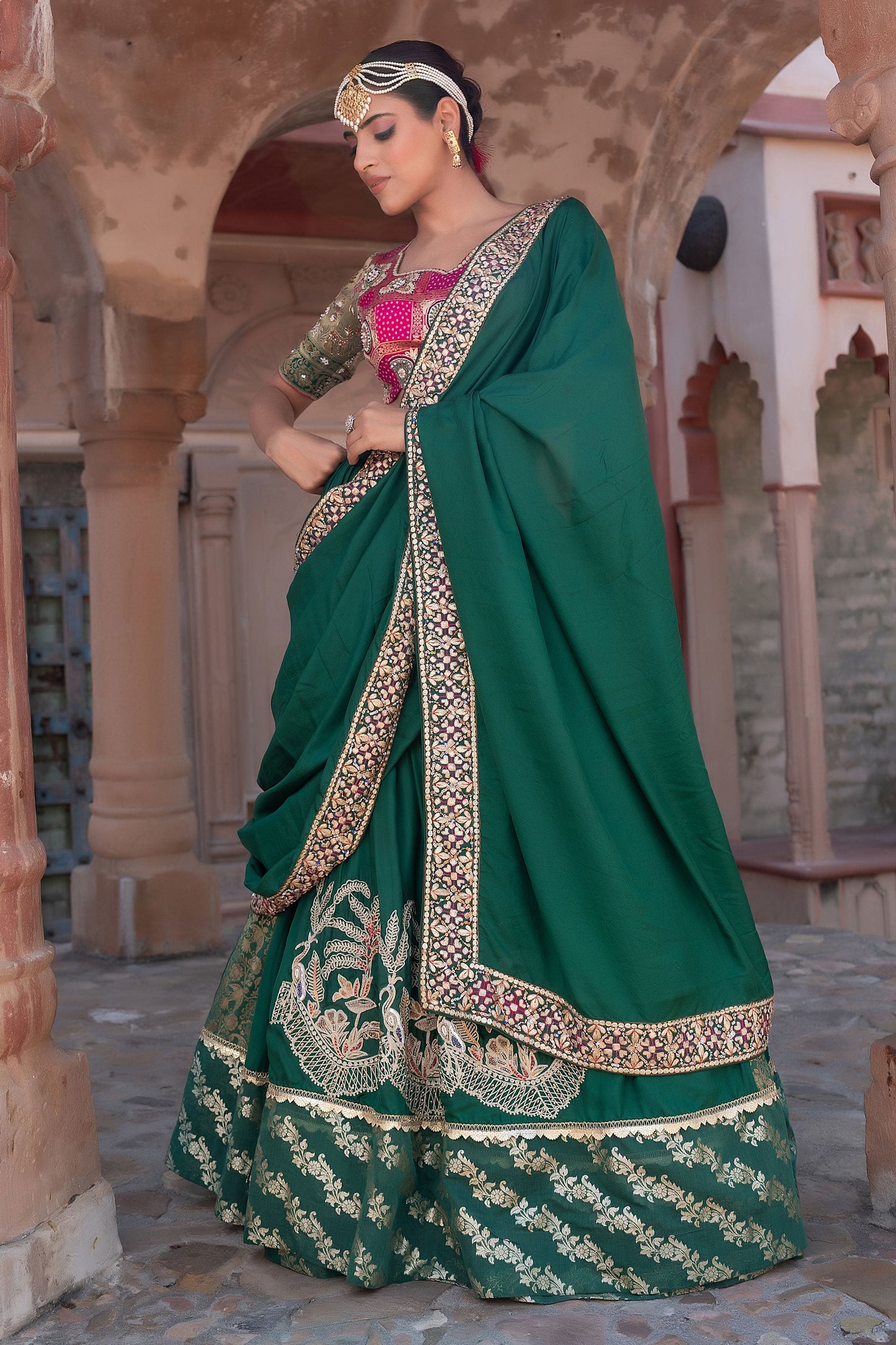 Green Silk Lehenga Saree With Gold Embroidery And Heavy Border Work