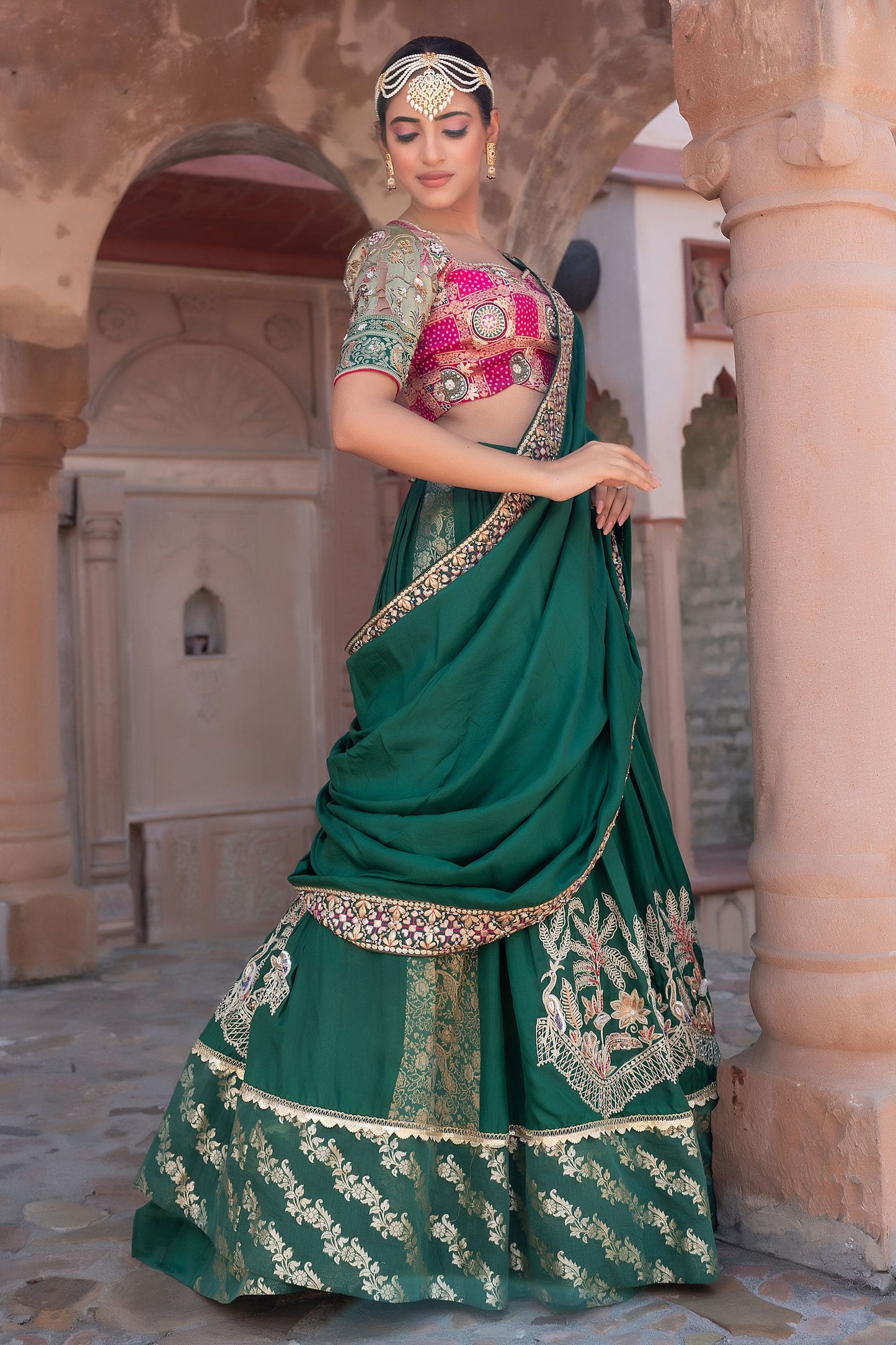 Green Silk Lehenga Saree With Gold Embroidery And Heavy Border Work