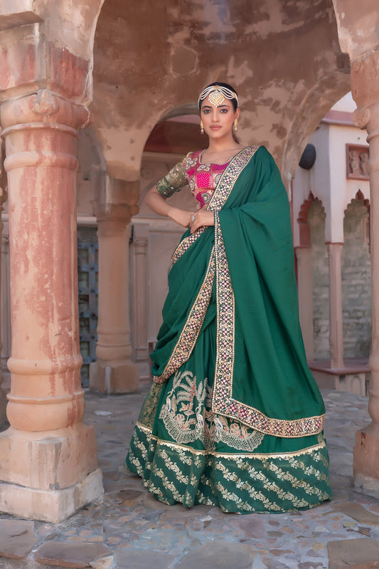 Green Silk Lehenga Saree With Gold Embroidery And Heavy Border Work
