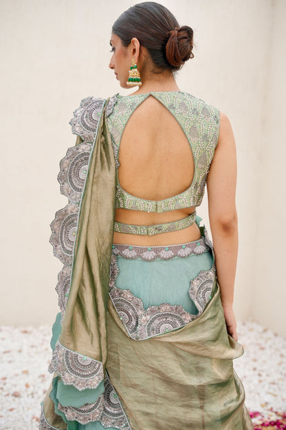 Sea Green Hand-Embroidered Wrinkle Lehenga Paired with Brocade Blouse and Cutwork Border Dupatta