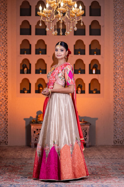 Festive Golden Tissue Cow Work Lehenga with Contrast Dupatta and Vibrant Pink Accents