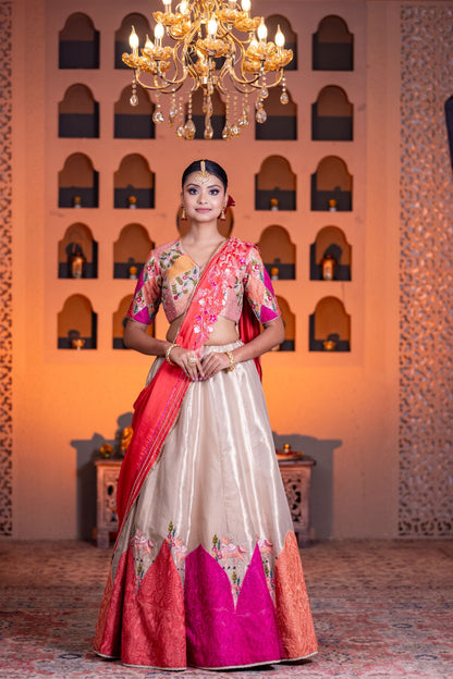Festive Golden Tissue Cow Work Lehenga with Contrast Dupatta and Vibrant Pink Accents