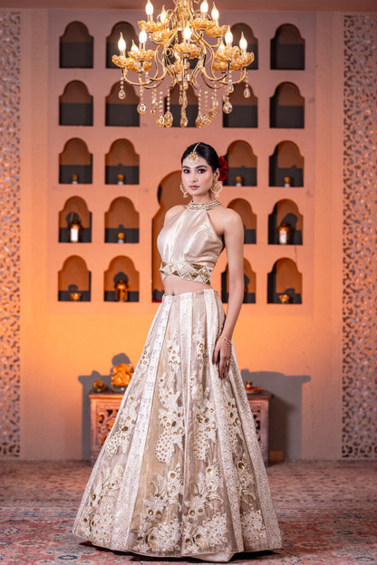 Bridal Style Golden Tissue Lehenga with Intricate Hand Embellishments and Halter Neck Brocade Blouse