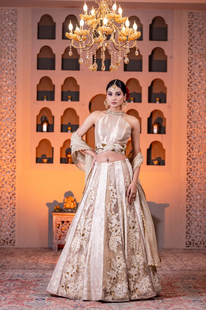 Bridal Style Golden Tissue Lehenga with Intricate Hand Embellishments and Halter Neck Brocade Blouse