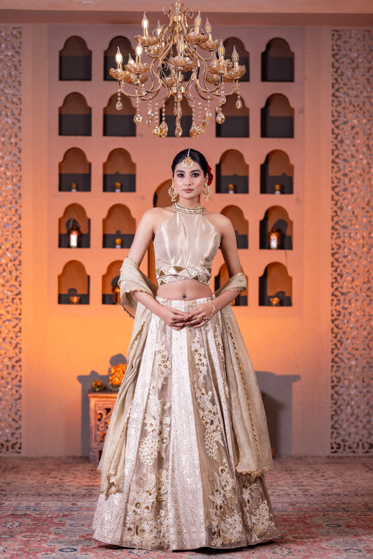Bridal Style Golden Tissue Lehenga with Intricate Hand Embellishments and Halter Neck Brocade Blouse