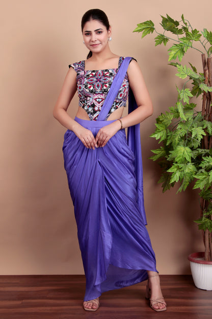 This stylish draped saree is paired with a printed  blouse