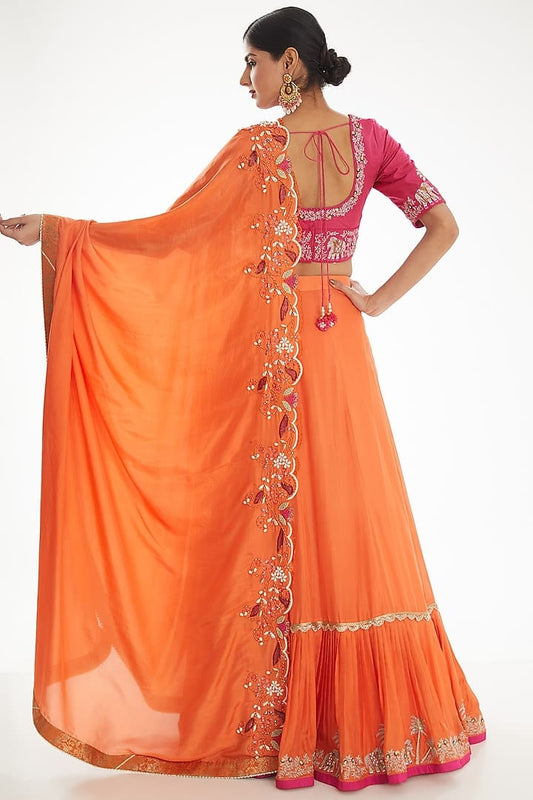 Luxury Orange Silk Lehenga Saree Adorned With Cutdana Pearl Zari And Sequins