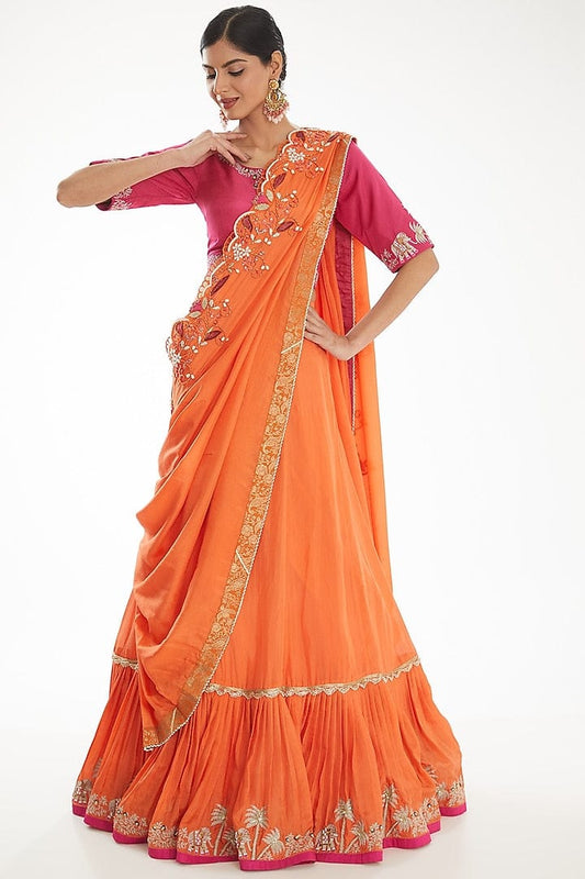 Luxury Orange Silk Lehenga Saree Adorned With Cutdana Pearl Zari And Sequins