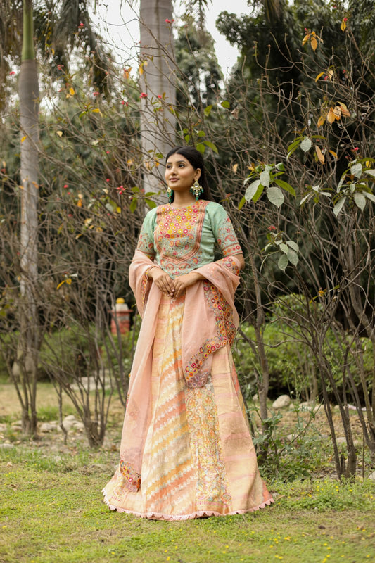 Luxury Peach-Mint Green Lehenga Saree Adorned with Mirror and Thread Embroidery