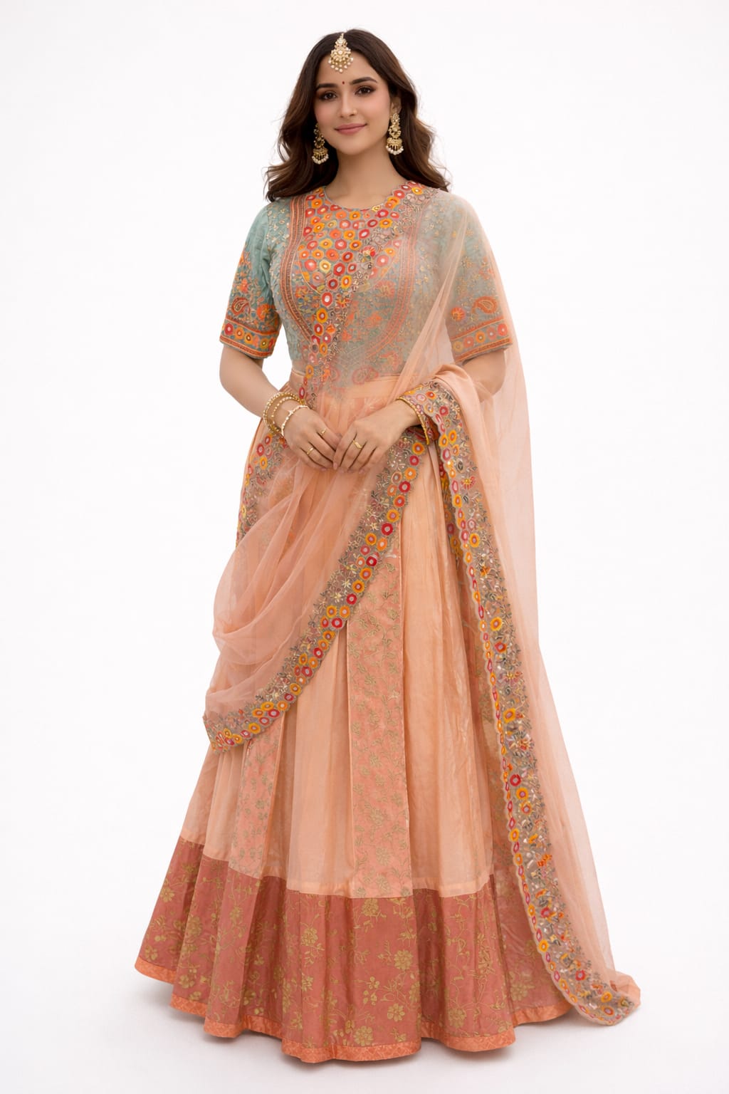 Peach and mint green lehenga saree in organza, silk, and tissue, embellished with thread, mirror, and sequin work.