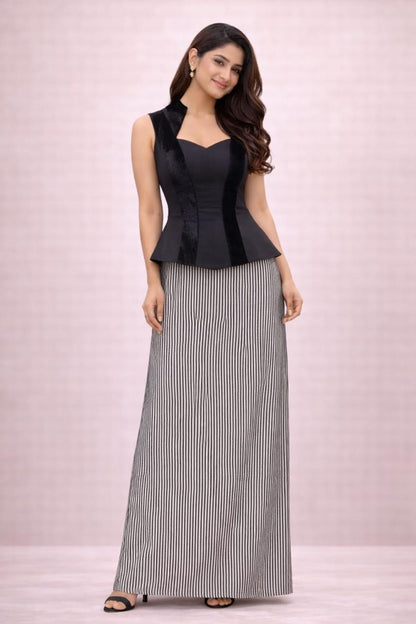 Black peplum top with black sequence skirt