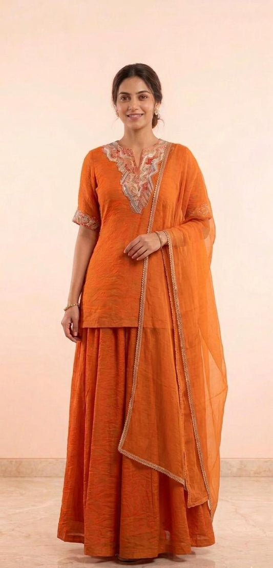Orange kurta with embellished neckline and flare sharara