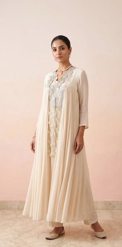 Off white gathered 2pc flare style dress with hangings in front