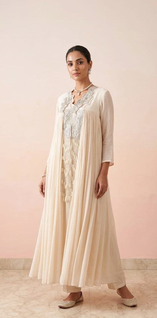 Off white gathered 2pc flare style dress with hangings in front