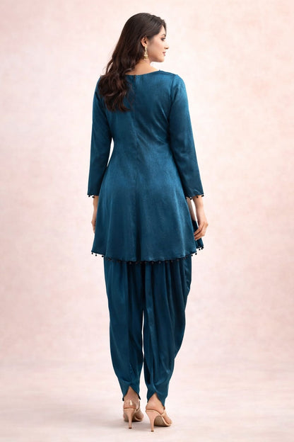 Teal blue corset with abstract work on neckline sequence & cutdana with dhoti pant