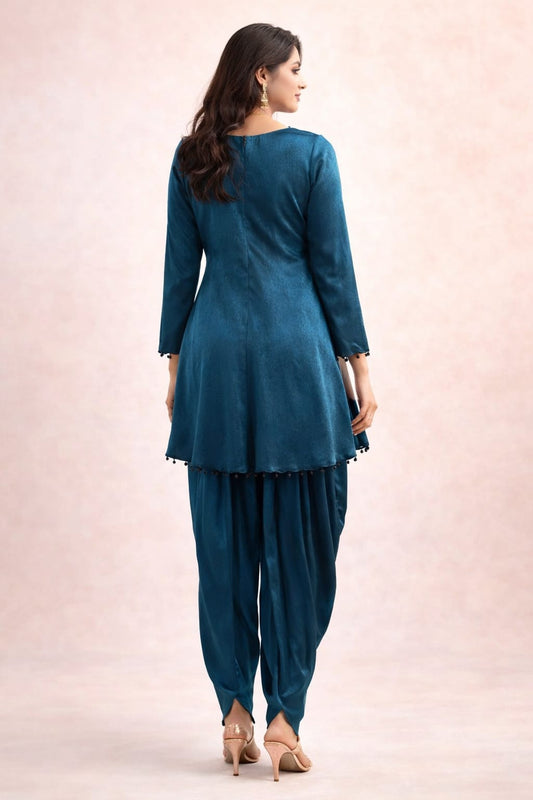 Teal blue corset with abstract work on neckline sequence & cutdana with dhoti pant