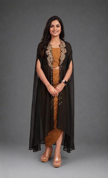Black cape with crushed tissue skirt & bustier with long hangings on cape